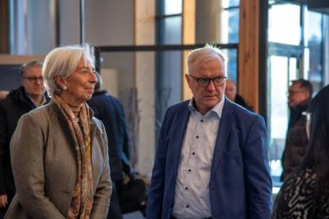 European Central Bank President Christine Lagarde and Governor of the Bank of Finland Olli Rehn arrive at the non-monetary policy meeting of the ECB's Gove